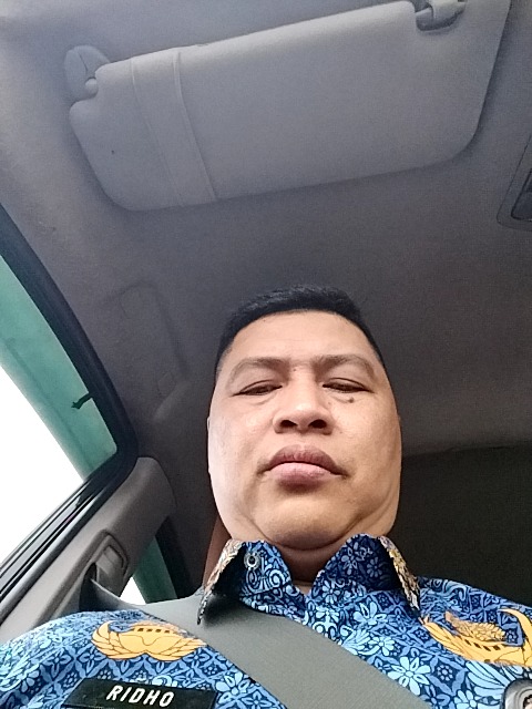 MUHAMMAD RIDHO, S.I.P., S.S., M.Si.